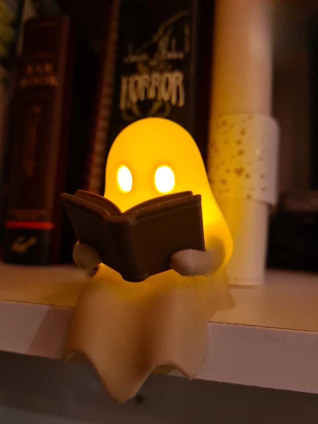 Reading Ghost Shelf-Sitter with Flickering Light