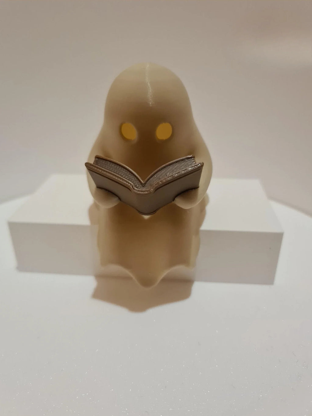 Reading Ghost Shelf-Sitter with Flickering Light